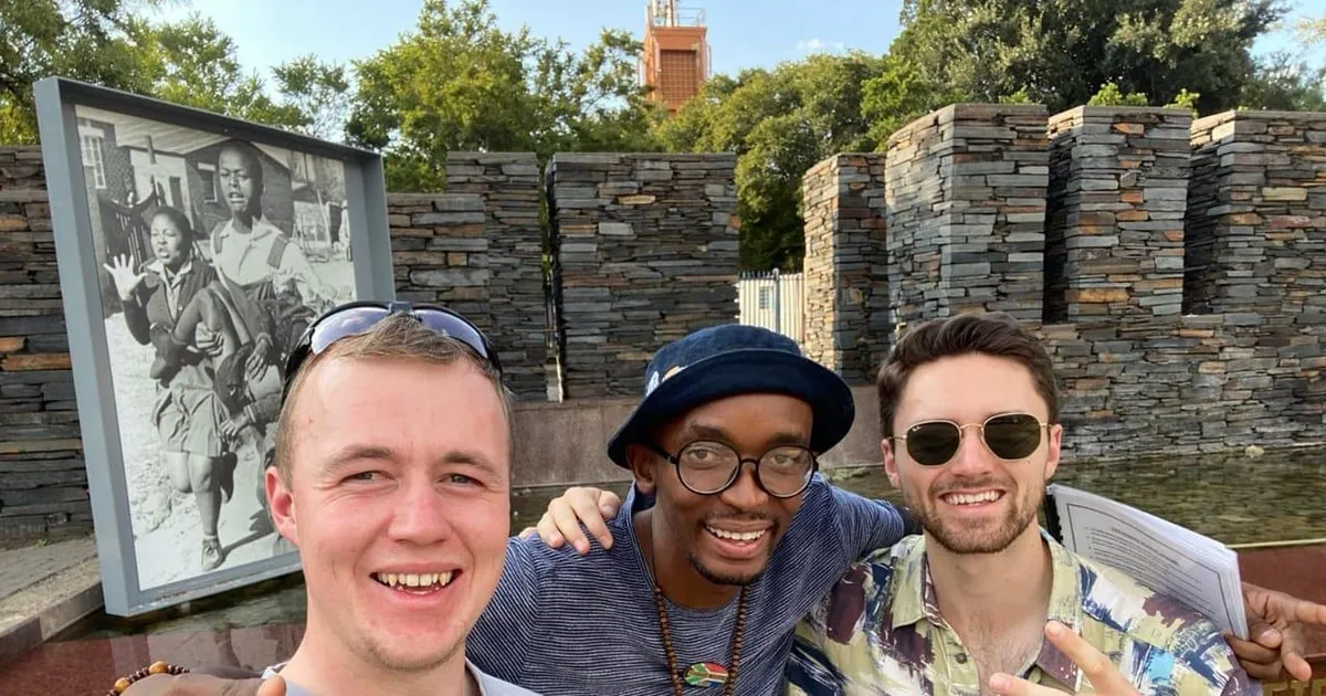 Local guide showing visitors Vilakazi Street in Soweto