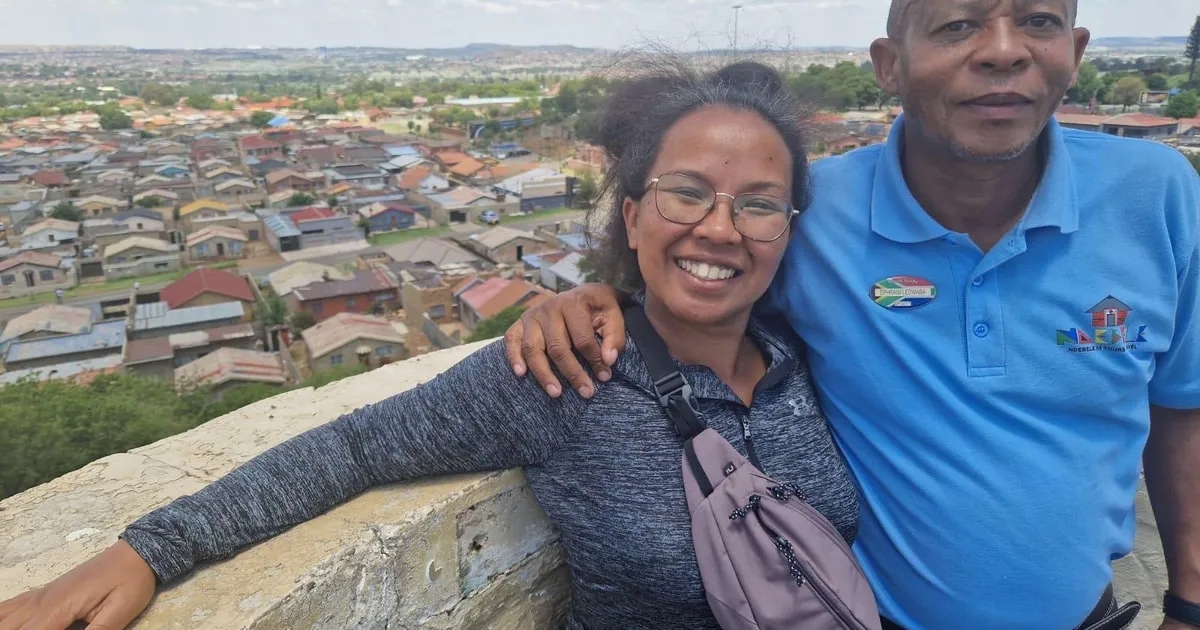 Minibus with visitors on a Soweto half day tour with hotel pickup