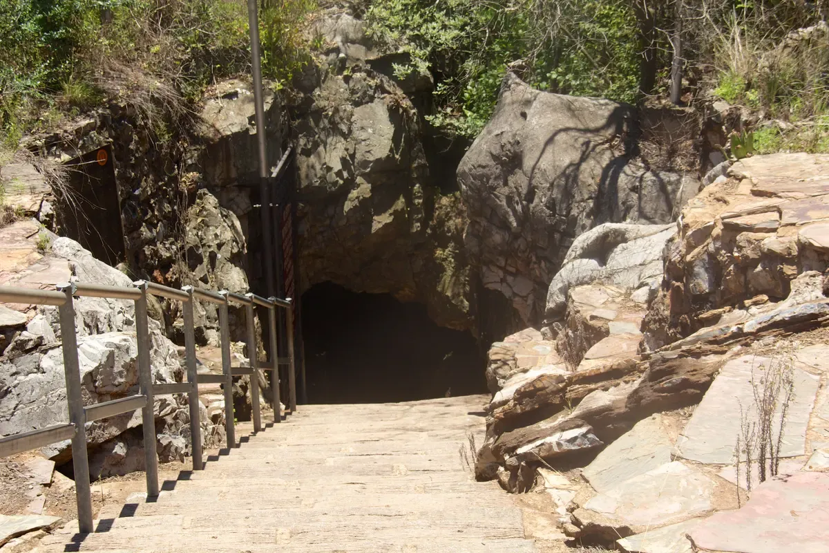 The entrance area of the Sterkfontein Caves in the Cradle of Humankind, with visitors gathering for a guided tour
