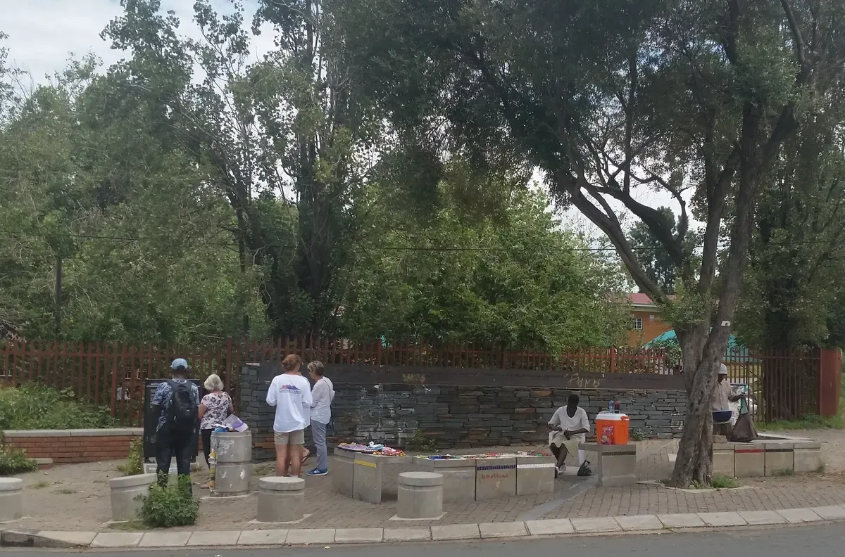 The stone memorial marking the site where Hector Pieterson was shot, at the corner of Vilakazi and Moema Streets in Soweto